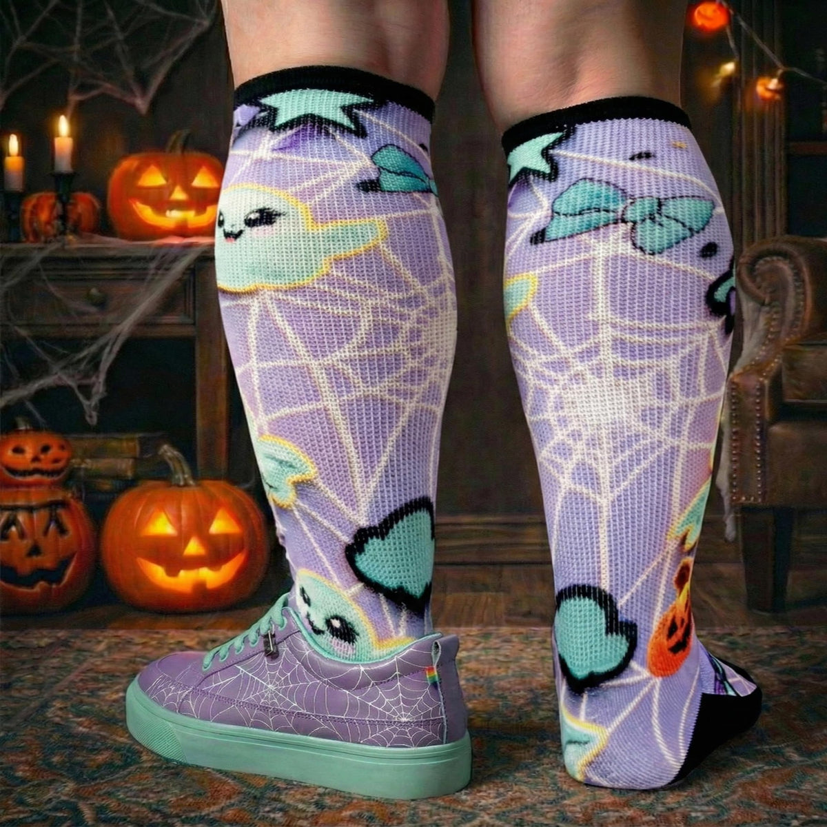 Back view of Gooi Halloween extra wide socks with ghost and spider web print on wide calves